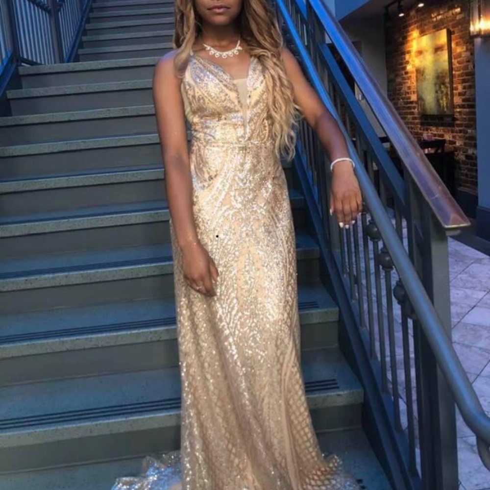 Beautiful gold dress for any special occasion. Worn once